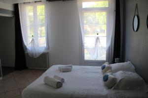 Katil atau katil-katil dalam bilik di LE CLOS DE L'O