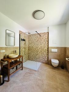 Koupelna v ubytování Pension Weiberwirtschaft in Pobershau + 37 fotografií