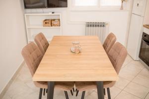 Kuchyň nebo kuchyňský kout v ubytování Apartmani Marica Beg