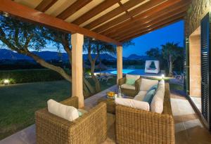 The swimming pool at or close to Owl Booking Villa Siquier - Luxury Retreat with Mountain Views
