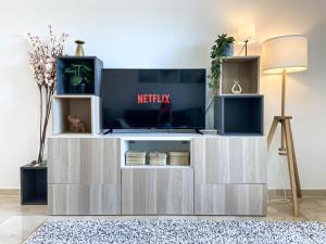 Televízia a/alebo spoločenská miestnosť v ubytovaní Teach Mhaire apartamento de vacaciones