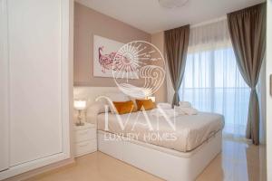 Postel nebo postele na pokoji v ubytování Casa BellaVista Ivan Luxury Homes 11ªPlta Sur 1ªLinea + 22 fotografií