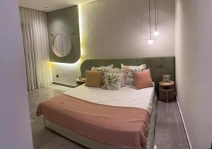Säng eller sängar i ett rum på Maarif appartement moderne
