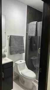 Ванна кімната в Facturamos, Un descanso ideal, a 5 minutos del malecón