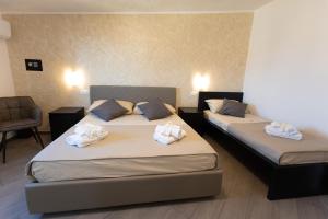 Postel nebo postele na pokoji v ubytování Bed and Breakfast Horizon