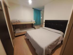 Postel nebo postele na pokoji v ubytování Hotel Trieste