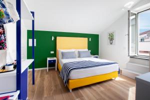 Postel nebo postele na pokoji v ubytování YourHome - Relais Loggia Li Galli