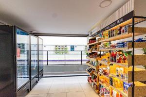 een supermarkt met uitzicht op een winkel bij Xtay BK30 Santana - Apartamentos decorados próximos ao metrô in Sao Paulo