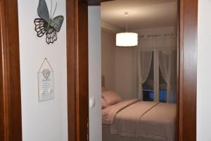 Postel nebo postele na pokoji v ubytování Apartman Get Rest