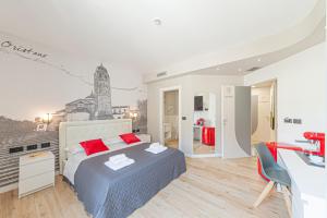 A bed or beds in a room at Eleonore Elegant Rooms