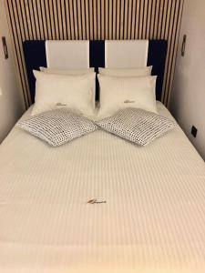 Ένα ή περισσότερα κρεβάτια σε δωμάτιο στο Casa del Fiocco