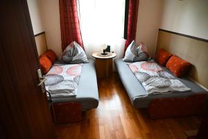 Posteľ alebo postele v izbe v ubytovaní Pelikan Apartman, strand 60 meter