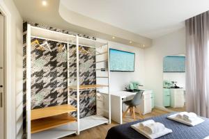 A bed or beds in a room at Eleonore Elegant Rooms