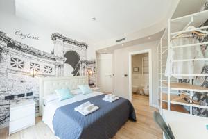 A bed or beds in a room at Eleonore Elegant Rooms