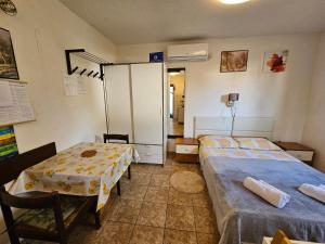 Postel nebo postele na pokoji v ubytování Apartments Ivan