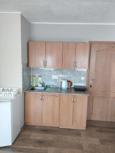 Kuchyň nebo kuchyňský kout v ubytování Apartmány Audy