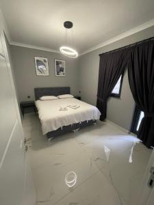 Postel nebo postele na pokoji v ubytování Continental Trabzon Suite&Apartments