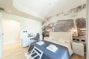 A bed or beds in a room at Eleonore Elegant Rooms