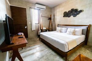 Postel nebo postele na pokoji v ubytování Hotel Siesta Holbox