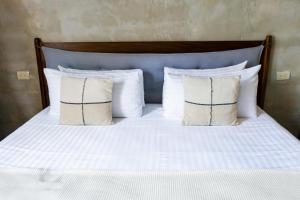 Postel nebo postele na pokoji v ubytování Hotel Siesta Holbox