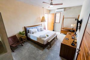 Postel nebo postele na pokoji v ubytování Hotel Siesta Holbox