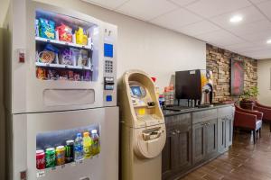 a kitchen with a refrigerator with food and drinks at Red Roof Inn Allentown South in Allentown