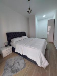 Postel nebo postele na pokoji v ubytování Gex apartments