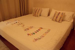 Postel nebo postele na pokoji v ubytování Casa Nomada Tuxtla Hotel - Hostal