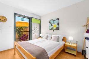 Postel nebo postele na pokoji v ubytování Apartment Felix + 37 fotografií