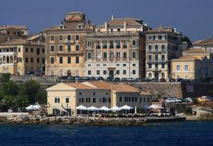 a group of buildings on the side of the water at 56s.m comftorable studio,airport area in Anemómylos