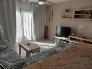 Televízia a/alebo spoločenská miestnosť v ubytovaní Atlantic Garden - Casa Helena