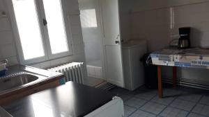 Kuchyňa alebo kuchynka v ubytovaní Maison de vacances familiale
