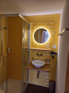 Koupelna v ubytování Gästezimmer im Dorfzentrum