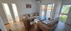 Posezení v ubytování De Lux Apartments Smolovic