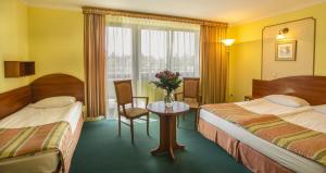 Posteľ alebo postele v izbe v ubytovaní Hotel Wersal