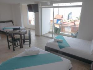 Imagen de la galería de Margaritas Palace Hotel, en Canoa