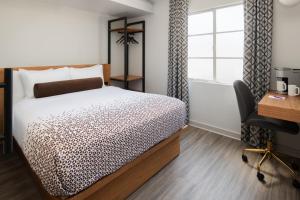 Postel nebo postele na pokoji v ubytování Hotel Keen