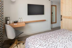 Postel nebo postele na pokoji v ubytování Hotel Keen
