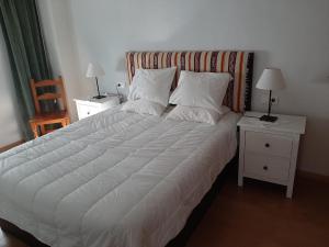 Postel nebo postele na pokoji v ubytování Apartamento Alberto Ricardo
