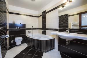 Koupelna v ubytování Apartmány Slunce