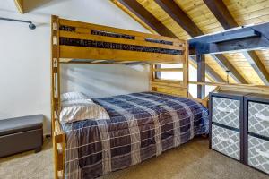 a bedroom with a bunk bed in a house at Brian Head Condo Walk to Giant Steps Ski Lifts! in Brian Head