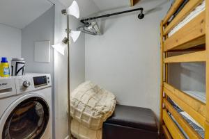 a laundry room with a washing machine and a lamp at Brian Head Condo Walk to Giant Steps Ski Lifts! in Brian Head