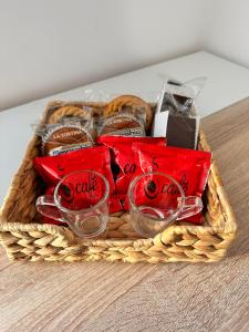 a basket filled with differentiatesiatesiatesiatesiatesiatesktop at Airport Al Volo B&B in Catania