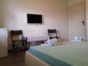 Cama ou camas em um quarto em Guest House Sombrero