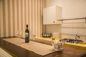Nápoje v ubytovaní Piazza Roma Rooms