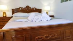 A bed or beds in a room at Villa Amaryllis