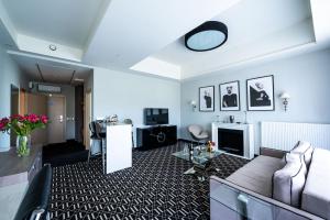 Kuchyňa alebo kuchynka v ubytovaní Hotel Atelia