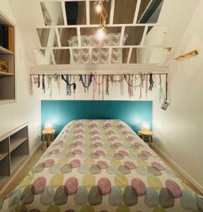 Ένα ή περισσότερα κρεβάτια σε δωμάτιο στο Gîte "Au Fourneau"