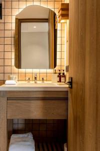 a bathroom with a sink and a mirror at 6 Guests - Amazing Views -Top Design in San José del Cabo +25 photos