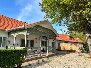 a house with an orange roof at Veranda Porta in Ordacsehi